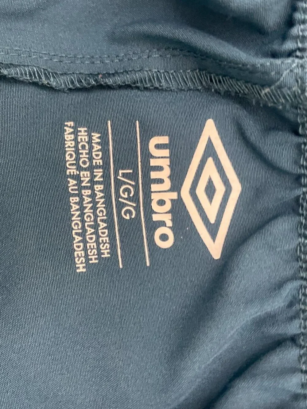 Umbro contact teal inseam